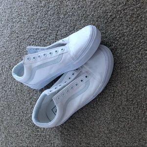 All white old Skool vans
